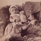 Small girl with doll